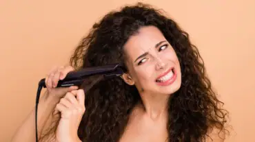 straightening your curly hair
