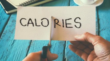 Reduce calories to gain muscle mass