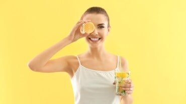 Woman with lemon juice