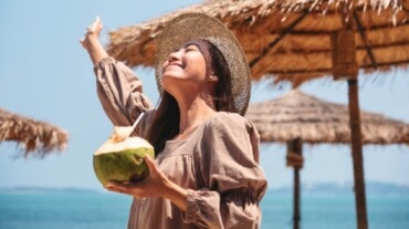 Woman enjoying coconut water