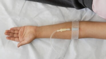 An arm with a drip on it